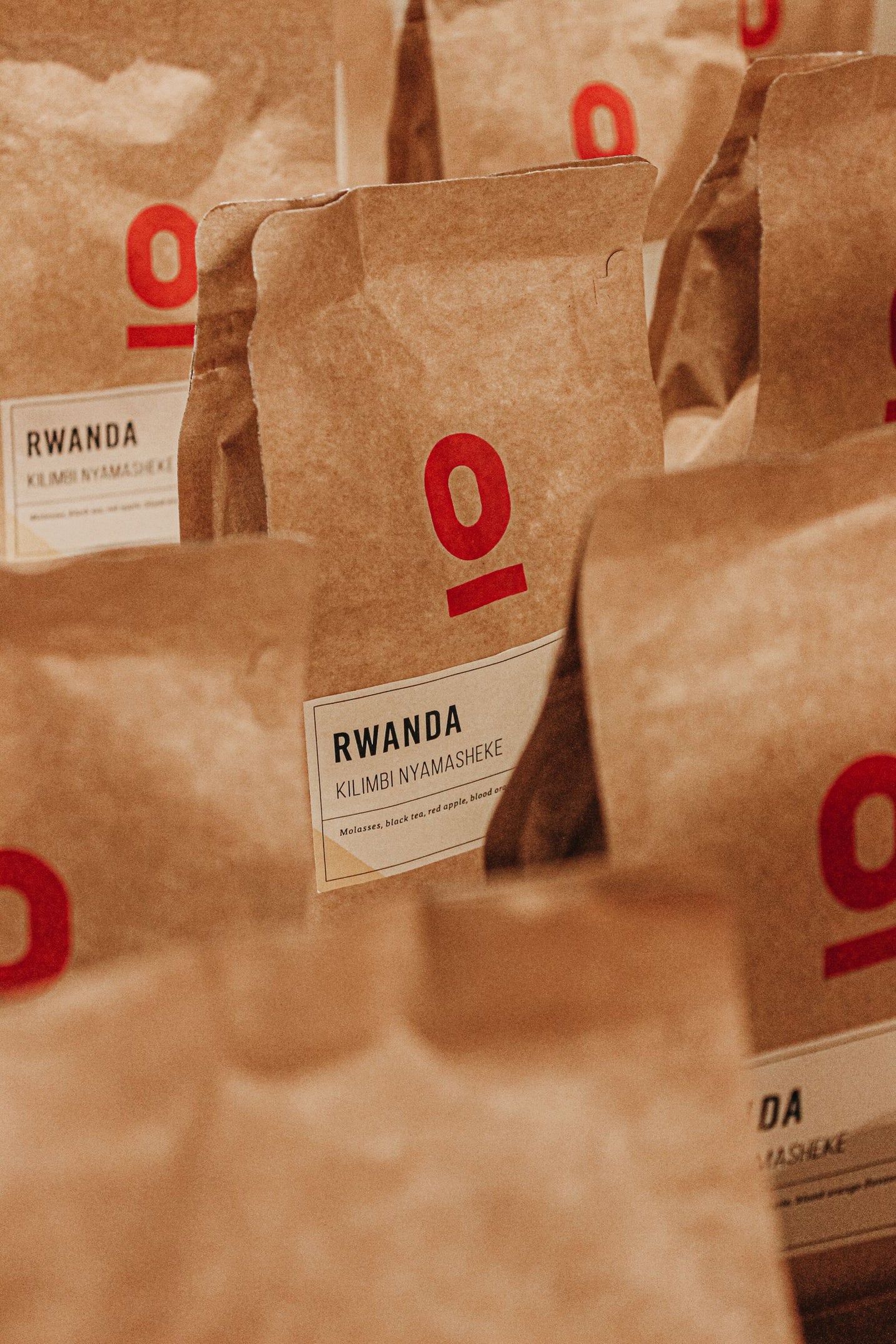 Rustic bags of roasted coffee beans resting after the roast