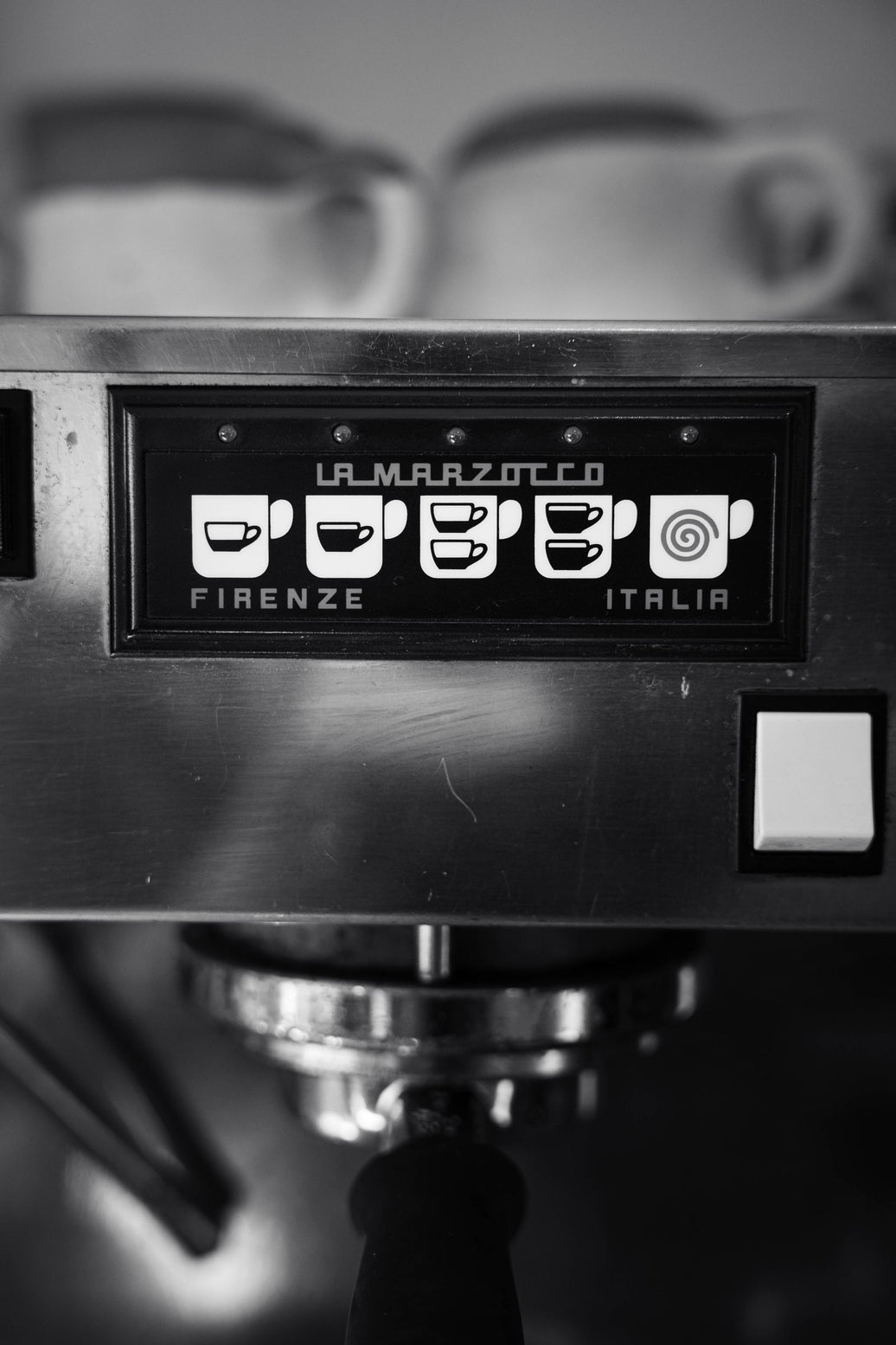 Close-up detail of a La Marzocco espresso machine control panel