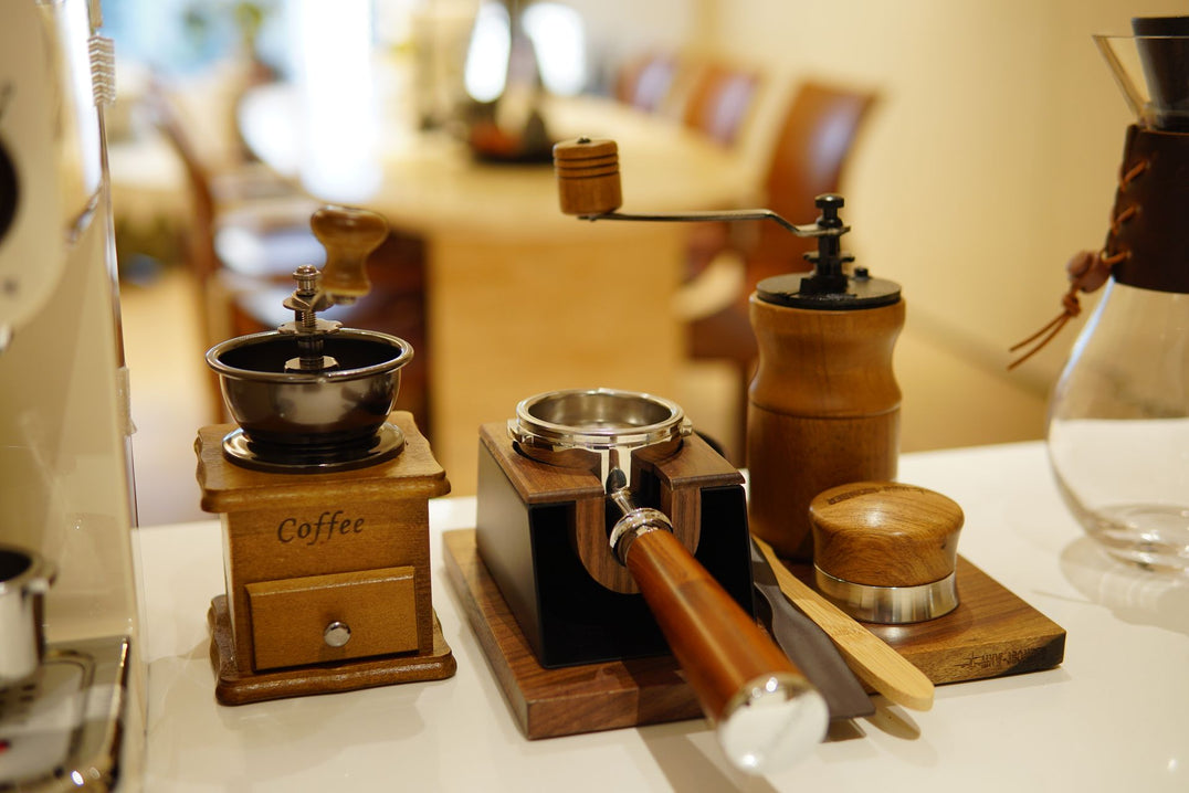 Brew bar lineup of coffee grinders and tools on display