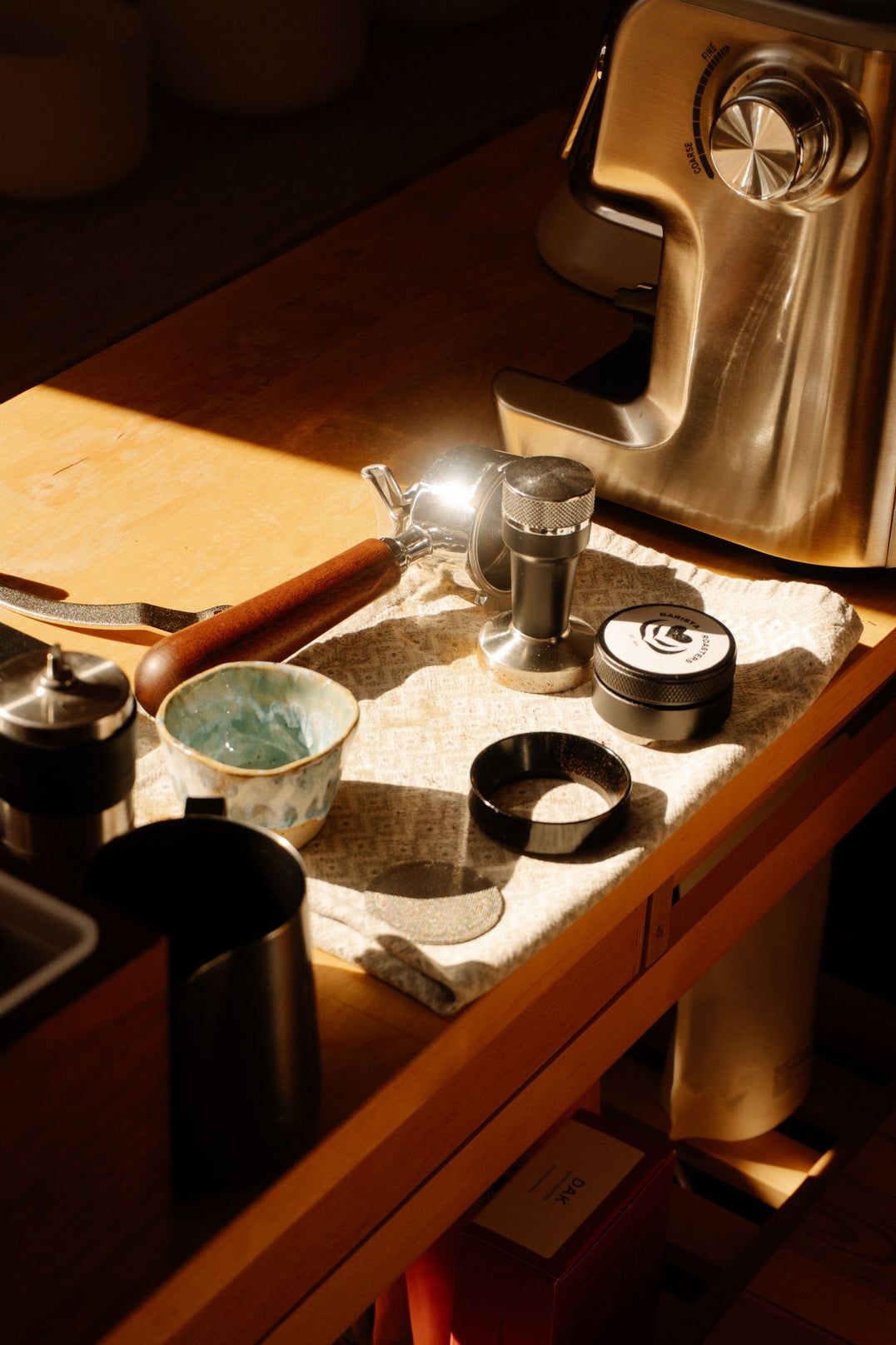 Home espresso machine on a wooden counter