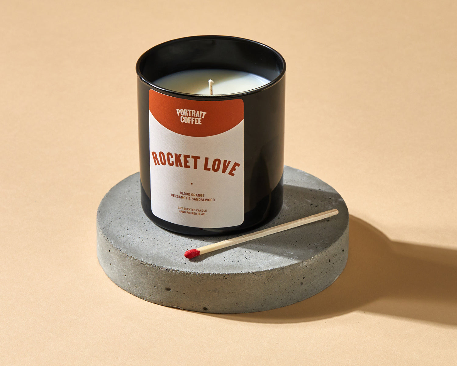 Rocket Love blood orange and sandalwood candle hand-poured by Portrait Coffee